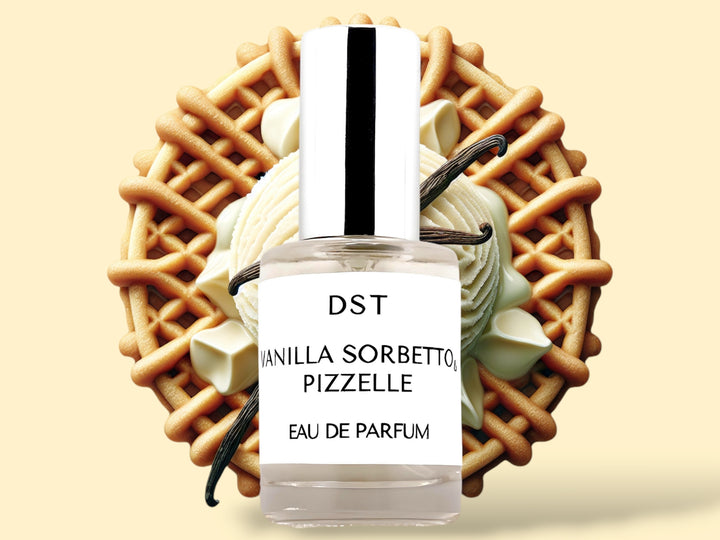 10ML bottle of Vanilla Sorbetto and Pizzelle Parfum sitting in front of a large Pizzelle cookie that is topped with vanilla Sorbetto and vanilla beans   against a cream background. 