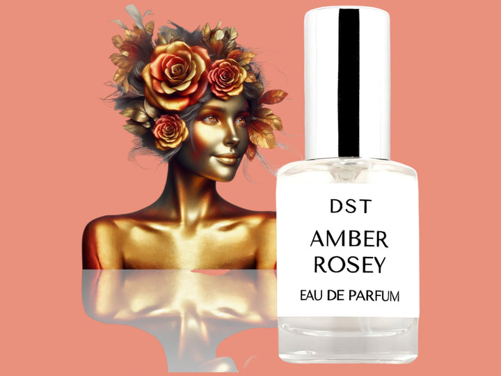 10ML bottle of Amber Rosey Parfum with the head and torso of a woman made of gold and hair made of gold leaves and amber roses, against a pink background. 