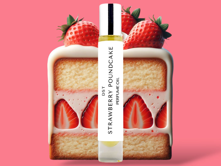 10ML bottle of Strawberry Poundcake perfume oil sitting in front of a large slice of Strawberry Poundcake topped with strawberries against a bright pink background. 