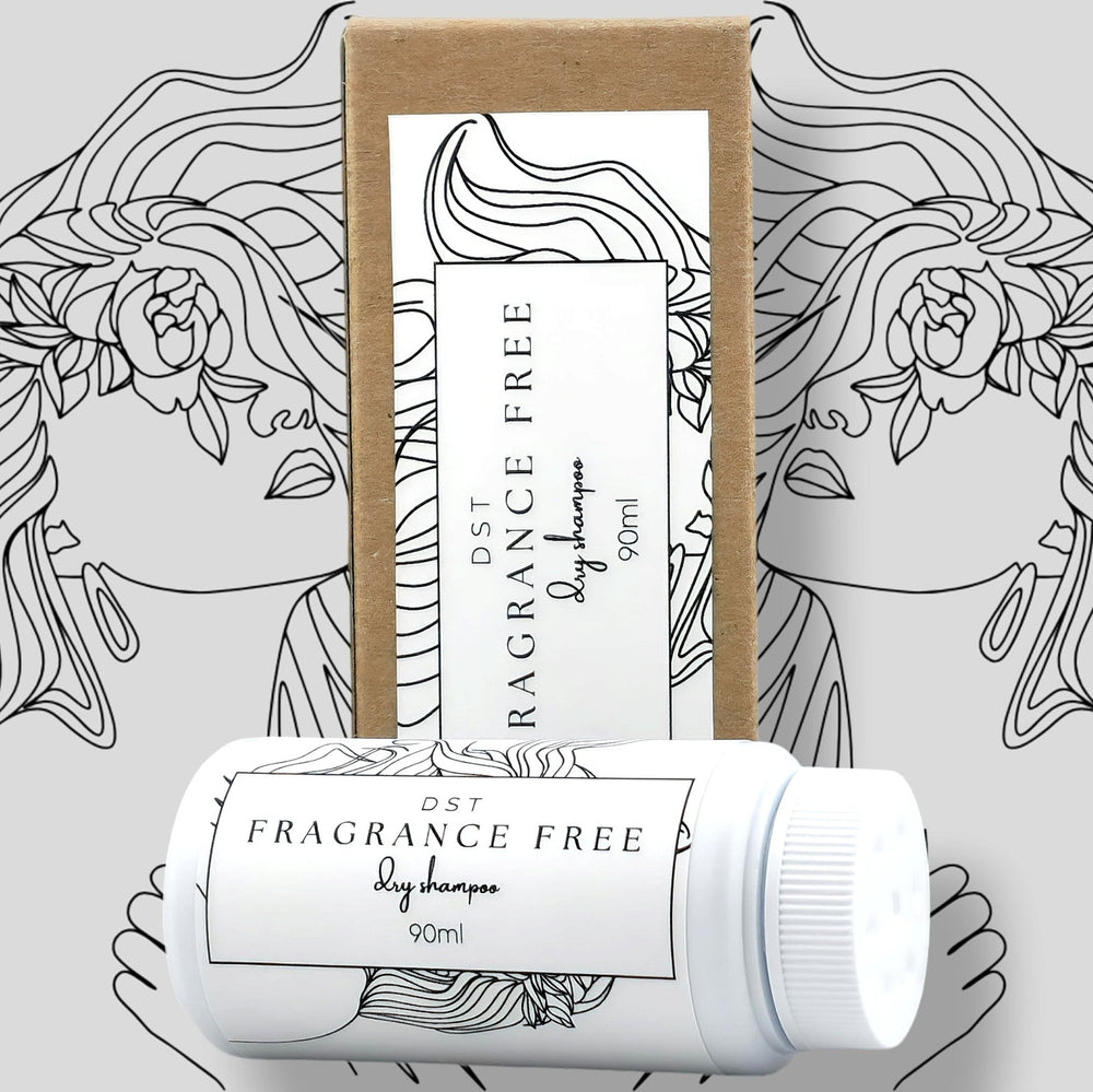 90ml bottle of Fragrance free Dry Shampoo powder and the box it is packaged in against grey background. 