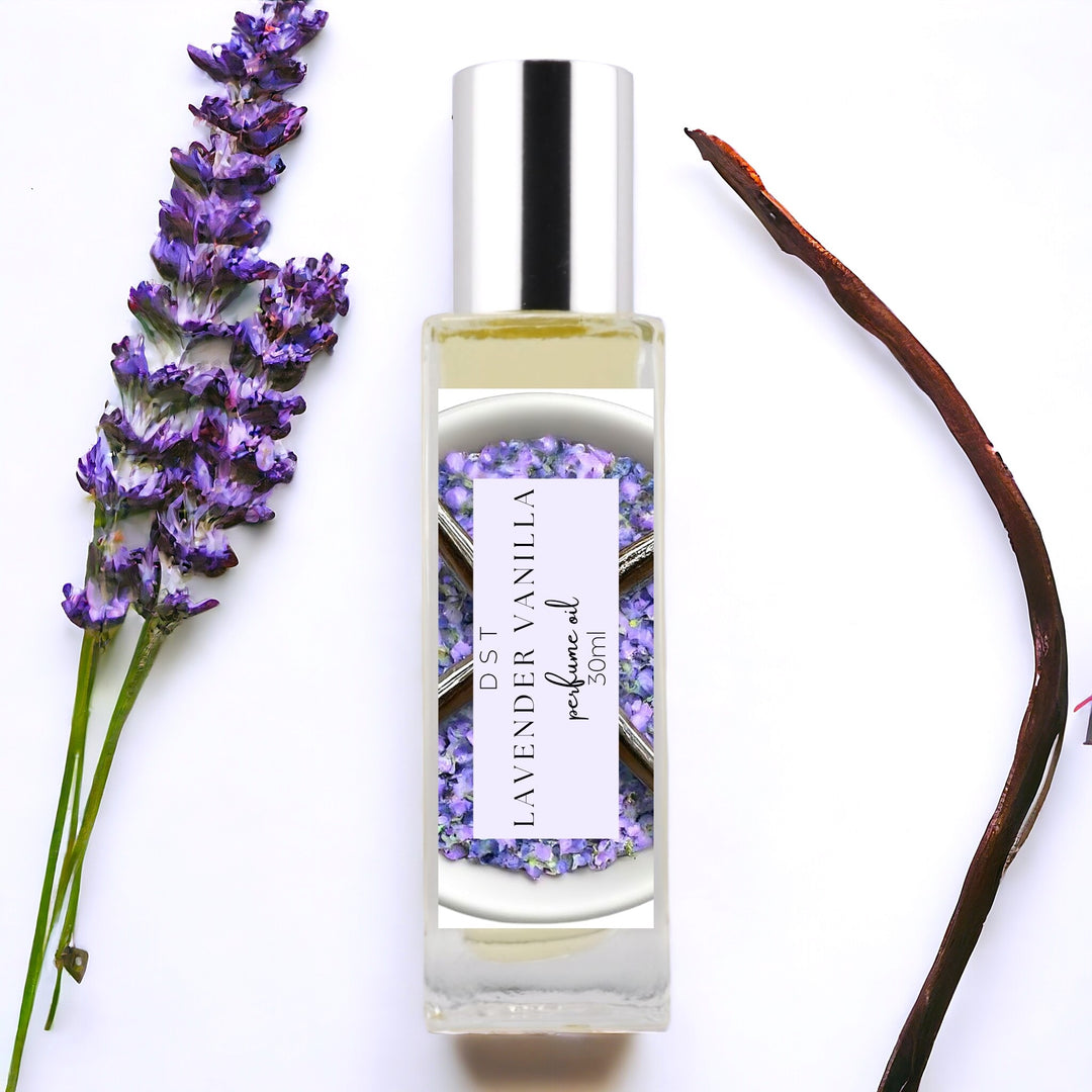 30ml bottle of Lavender vanilla perfume oil against a white background with lavender buds and long vanilla bean.