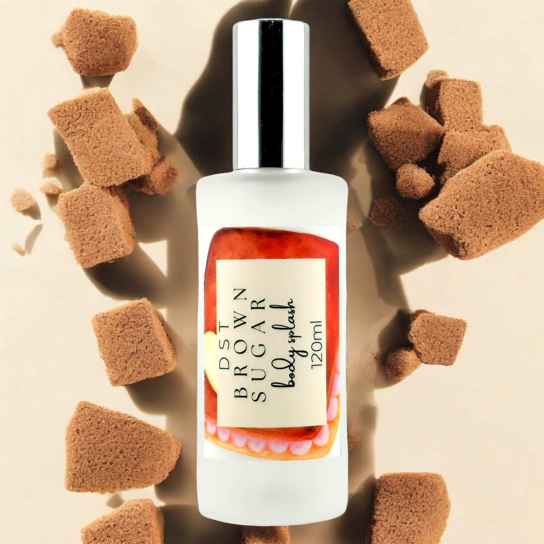 120ml bottle of Brown Sugar body splash against a tan background with brown sugar cubes.