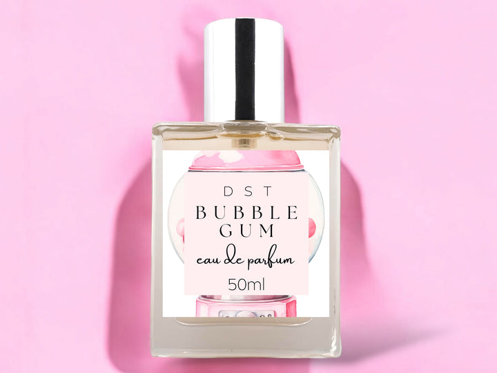 50ml bottle of Bubblegum scented Eau de Parfum Spray on a pink background. 