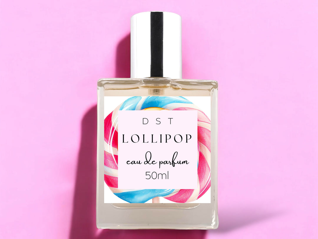 50ml bottle of Lollipop scented Eau de Parfum spray against a pink background.