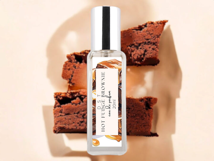 20ml bottle of hot fudge brownie eau de parfum on muted white background with brown brownie