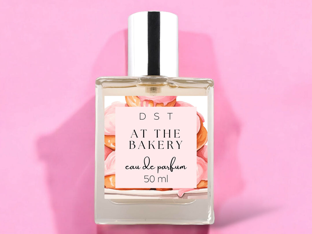 50ml bottle of at the bakery eau de parfum on pink background