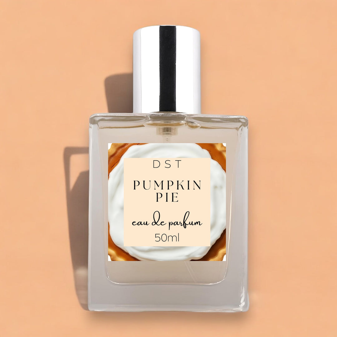 50ml bottle of Pumpkin Pie Eau de Parfum against a pastel orange background.