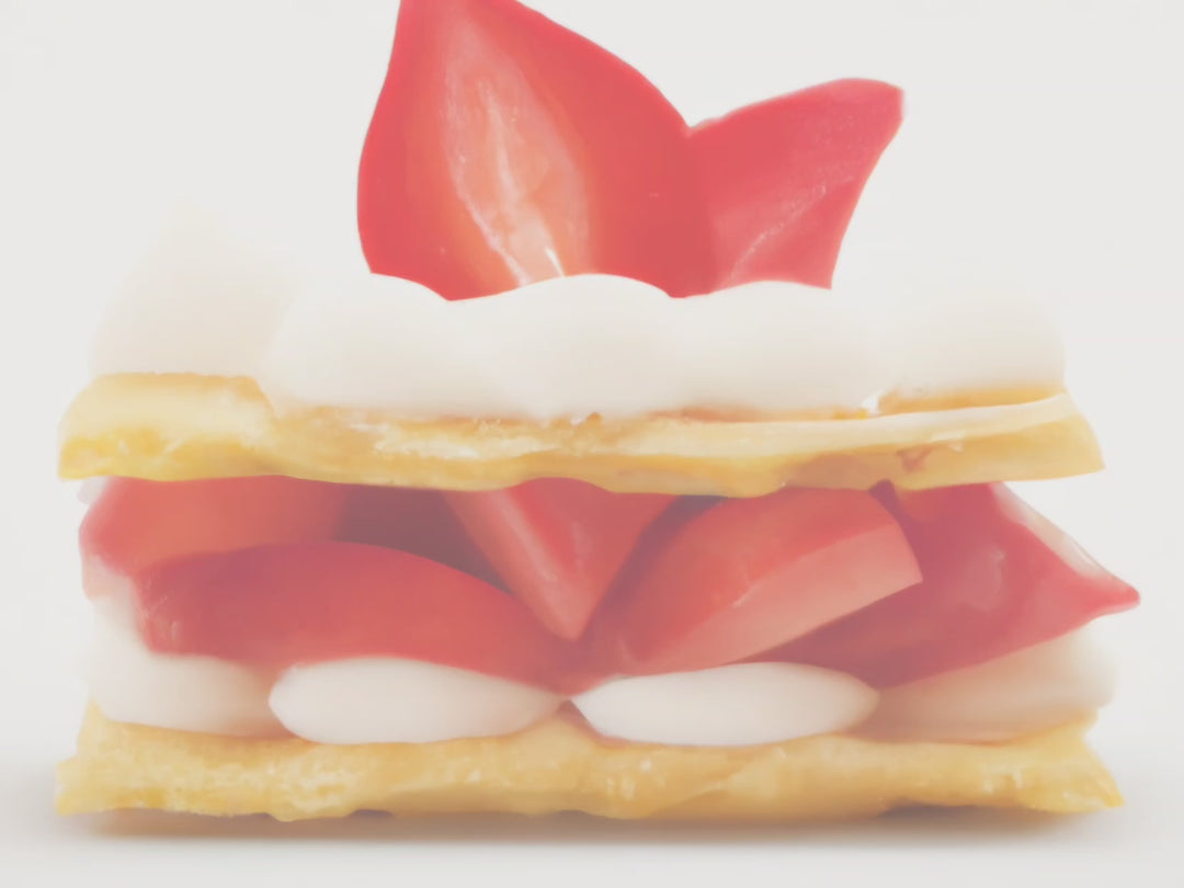 Muted Video showing text fragrance description for Strawberry Shortcake. The decadent  aroma of vanilla shortcake topped with heaping  helpings of fresh picked strawberries  & whipped cream.  
