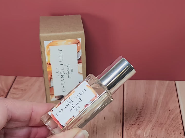 muted video of 5ml bottle of Caramel Fluff scented perfume oil and the box it is packaged in.